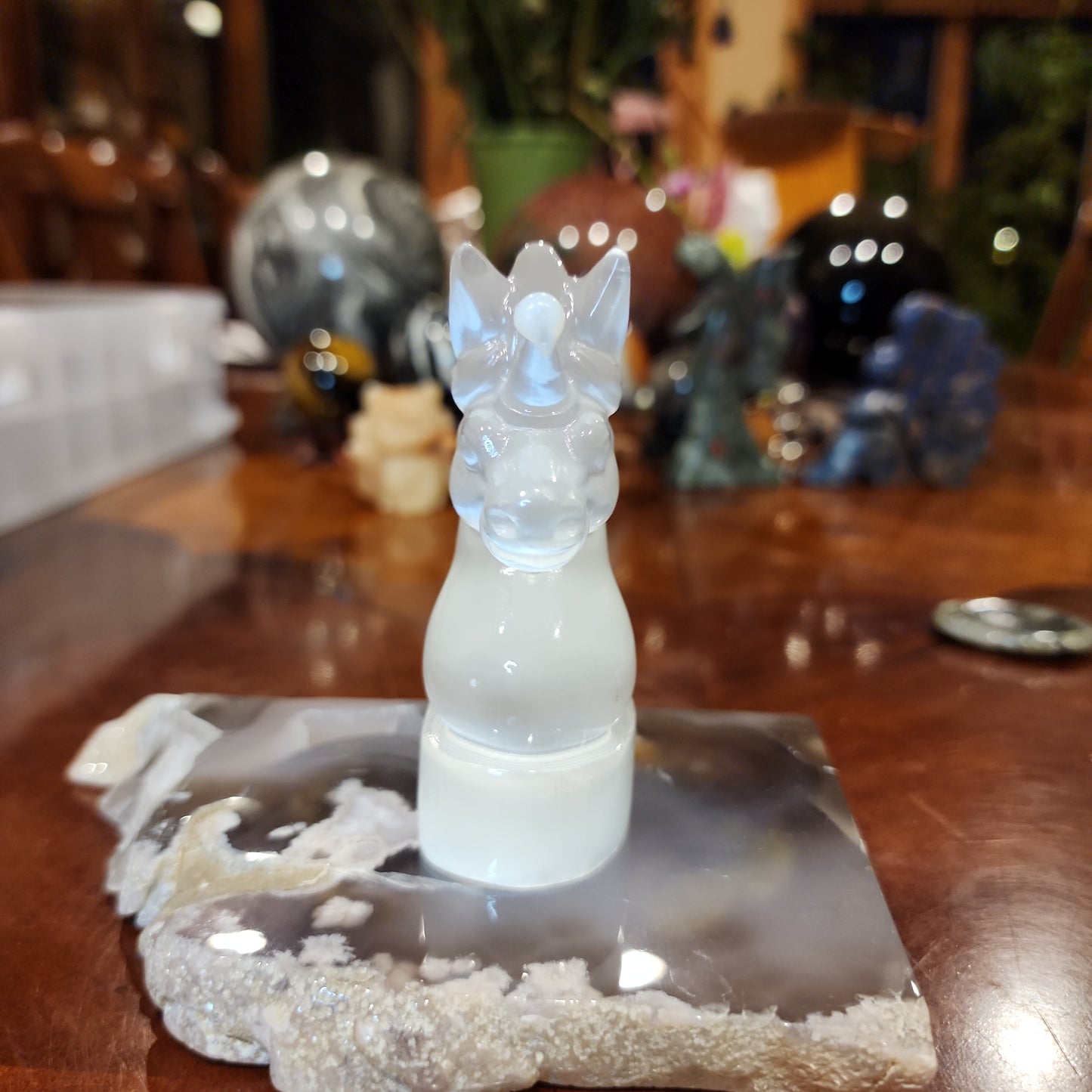 Selenite unicorn carving