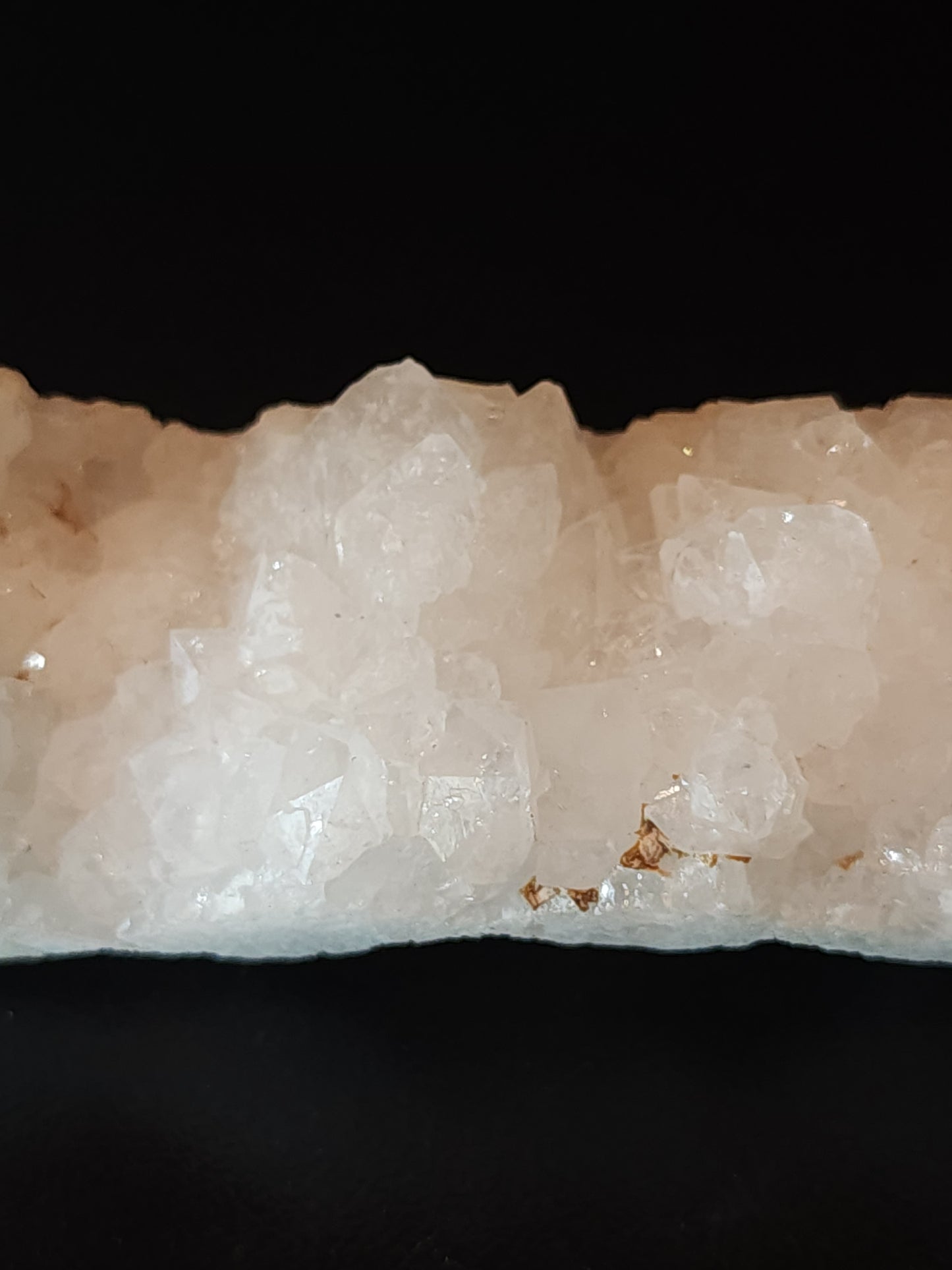 Raw white calcite cluster