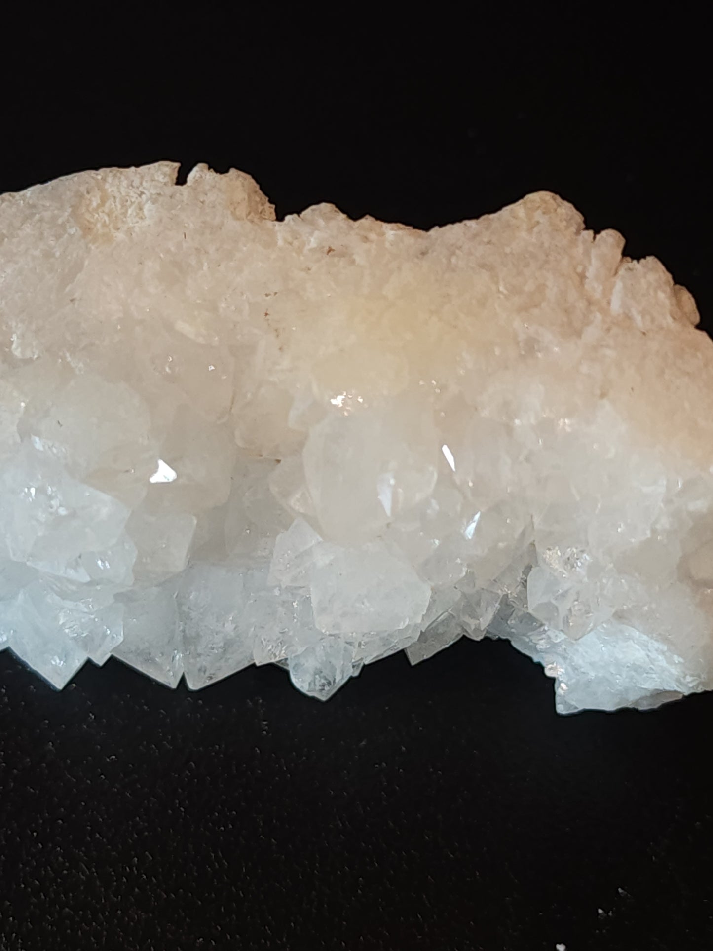 Raw white calcite cluster