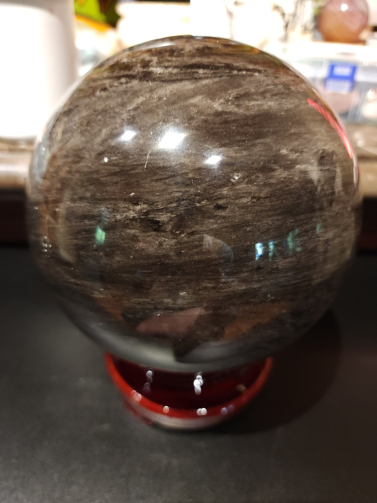 Large silver obsidian sphere