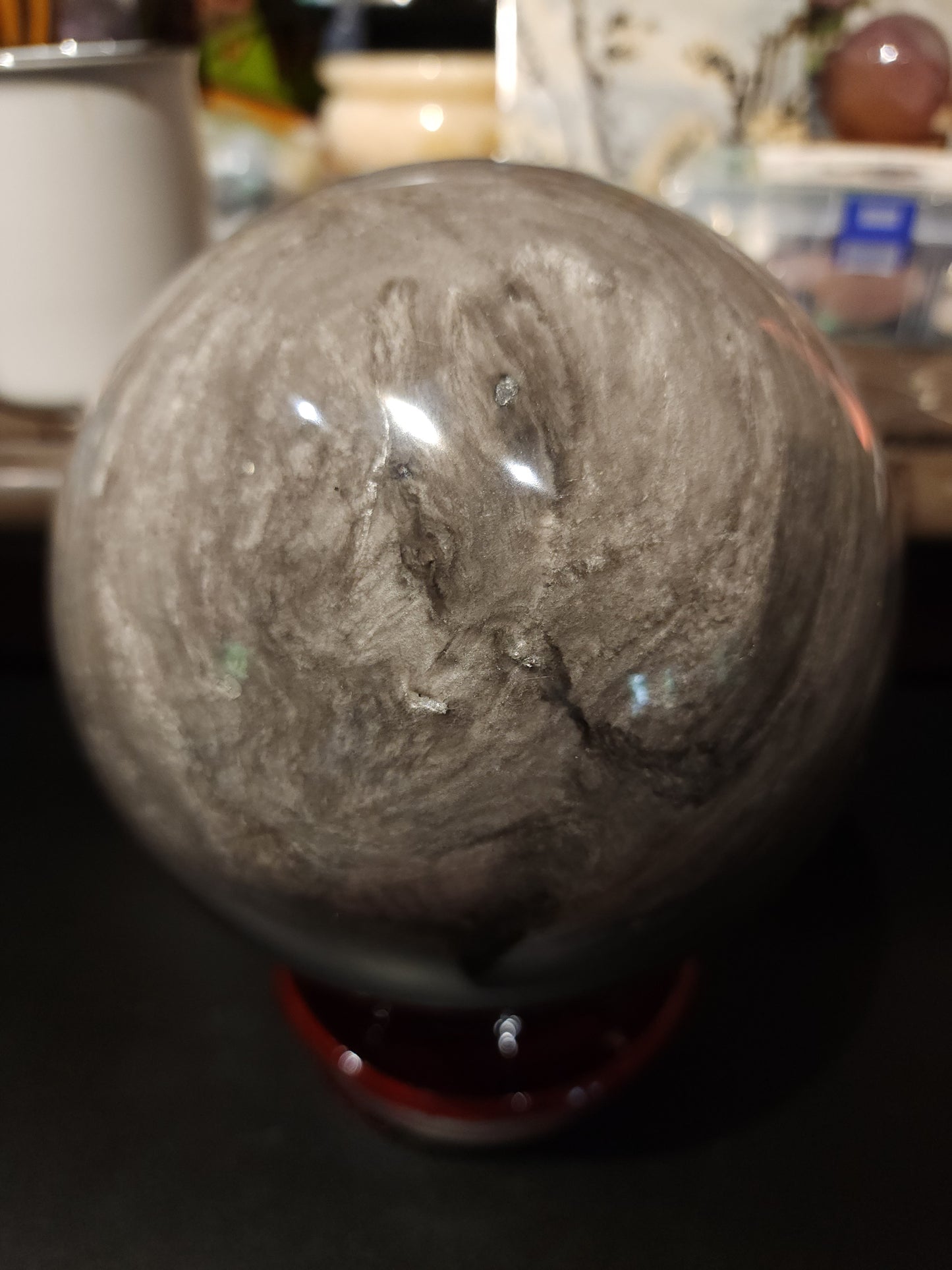Large silver obsidian sphere