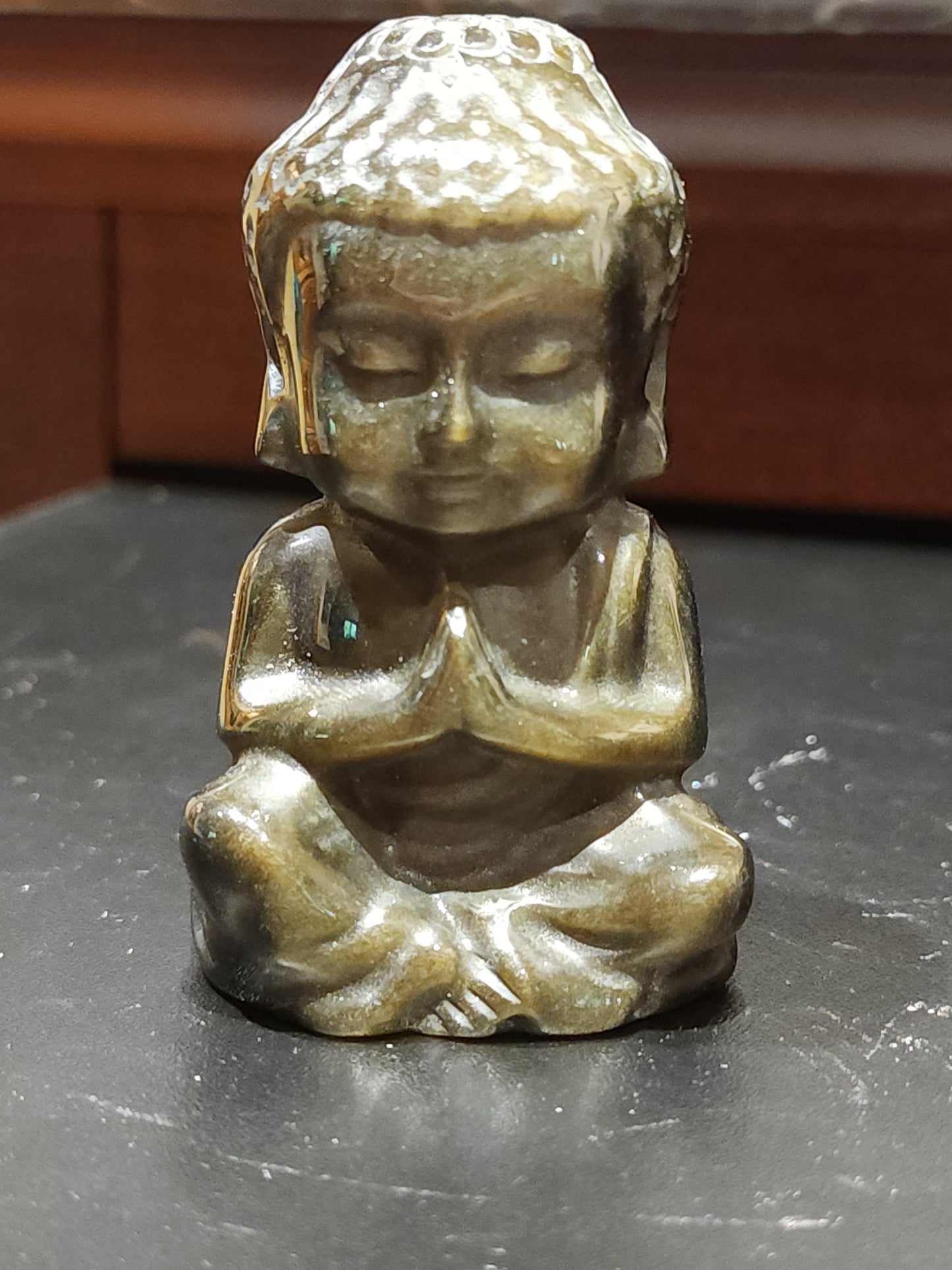 Golden obsidian buddha