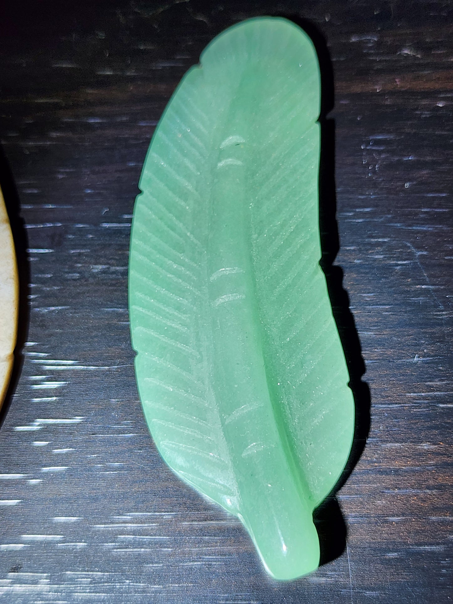 Green aventurine feather carving