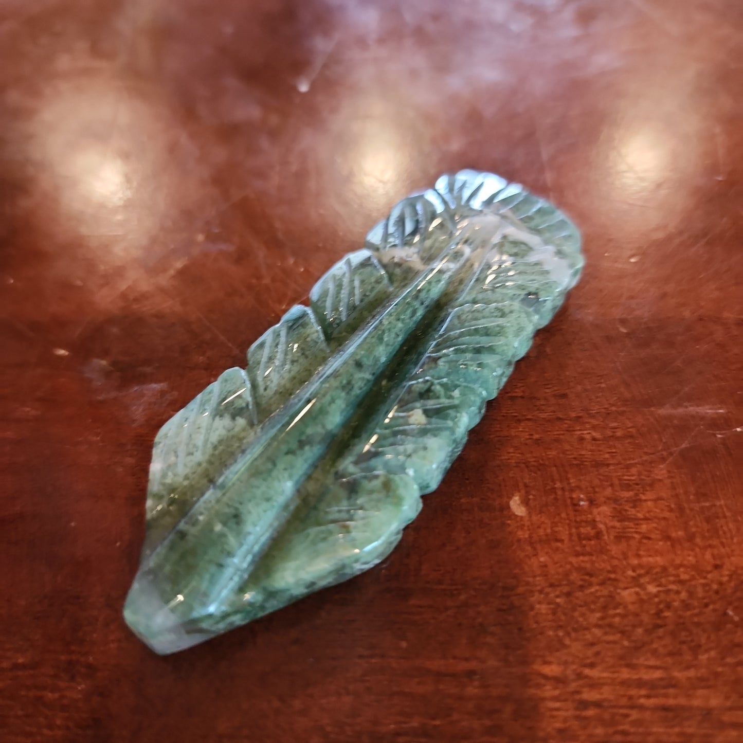 Moss agate feather carving